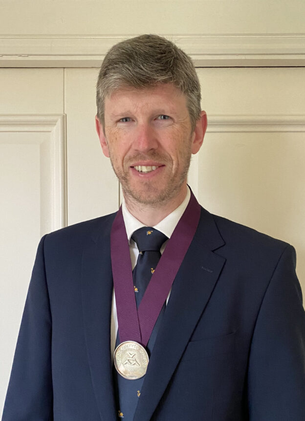 New chairperson Robert Laird wearing chain of office